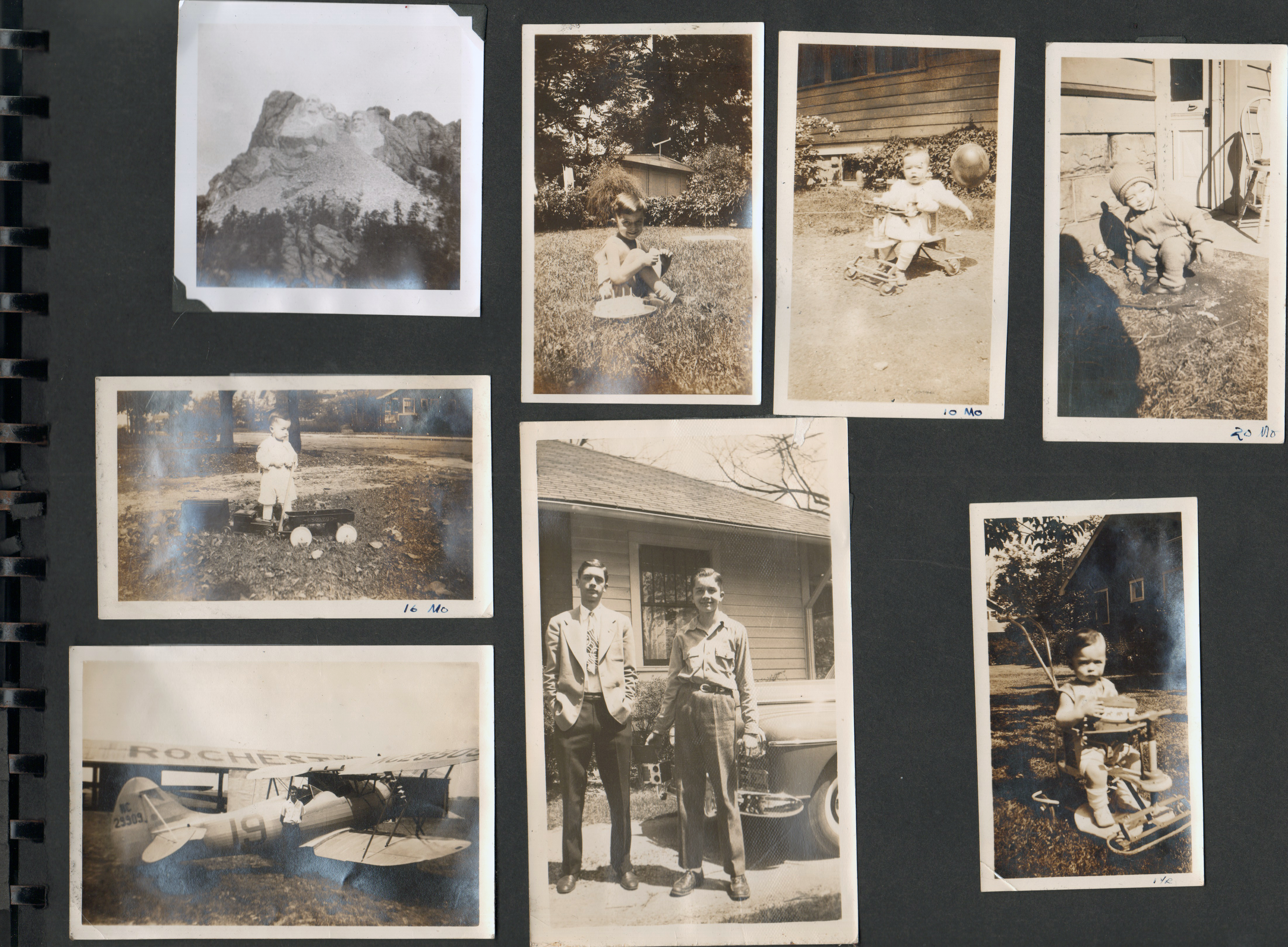 (Mount Rushmore. old plane, 6122 Carrollton John Hague 10 months. John and Glen in driveway with car)