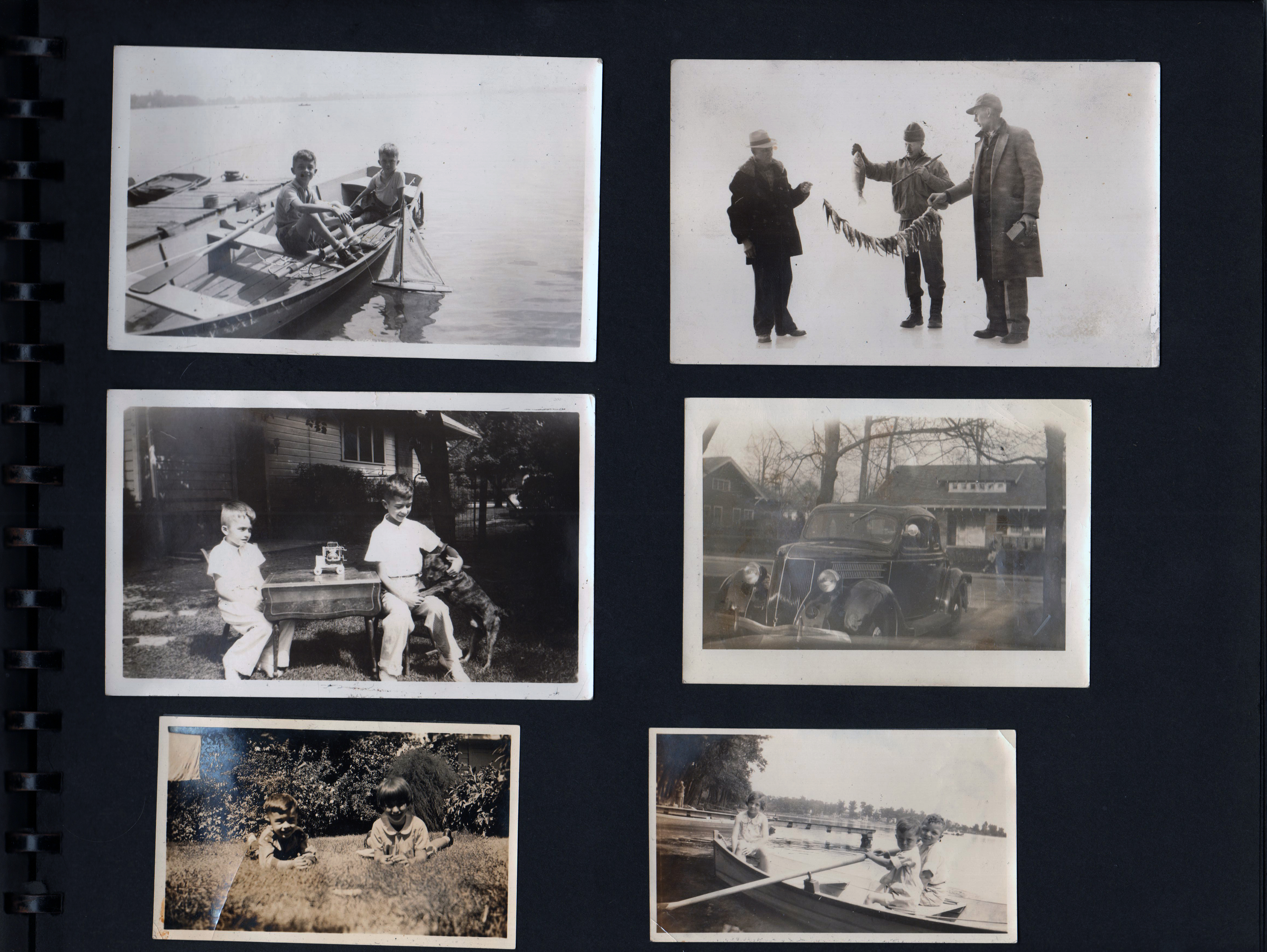 (lake - John in rowboat - toy sailboat. Girstle with fish. 6122 yard John with dog. Car in Driveway.)