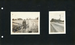woman on fence. Large building, cars next to train tracks.