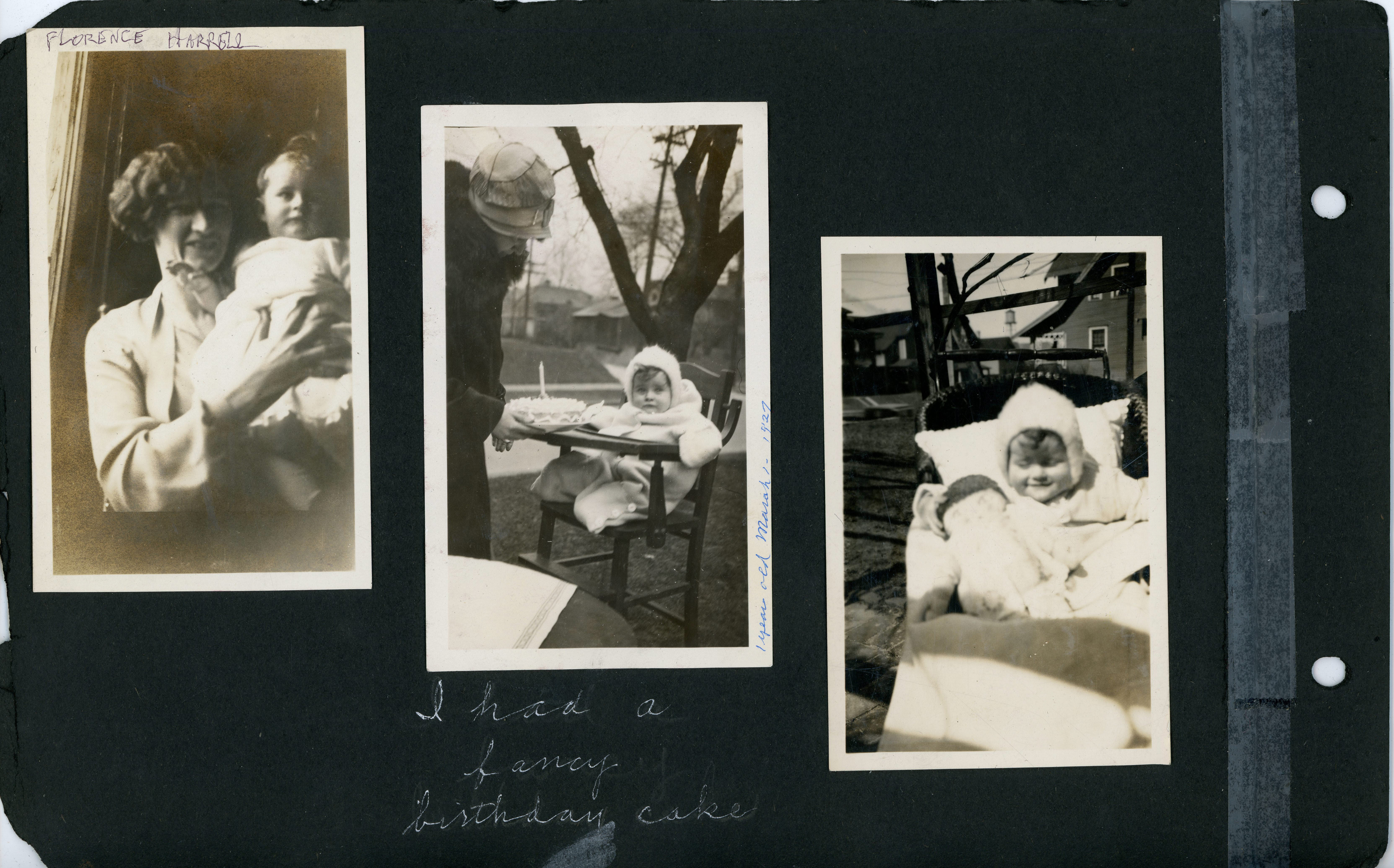 I had a fancy birthday cake - Florence Harrell holding Rosemary. In highchair with cake March 1, 1927