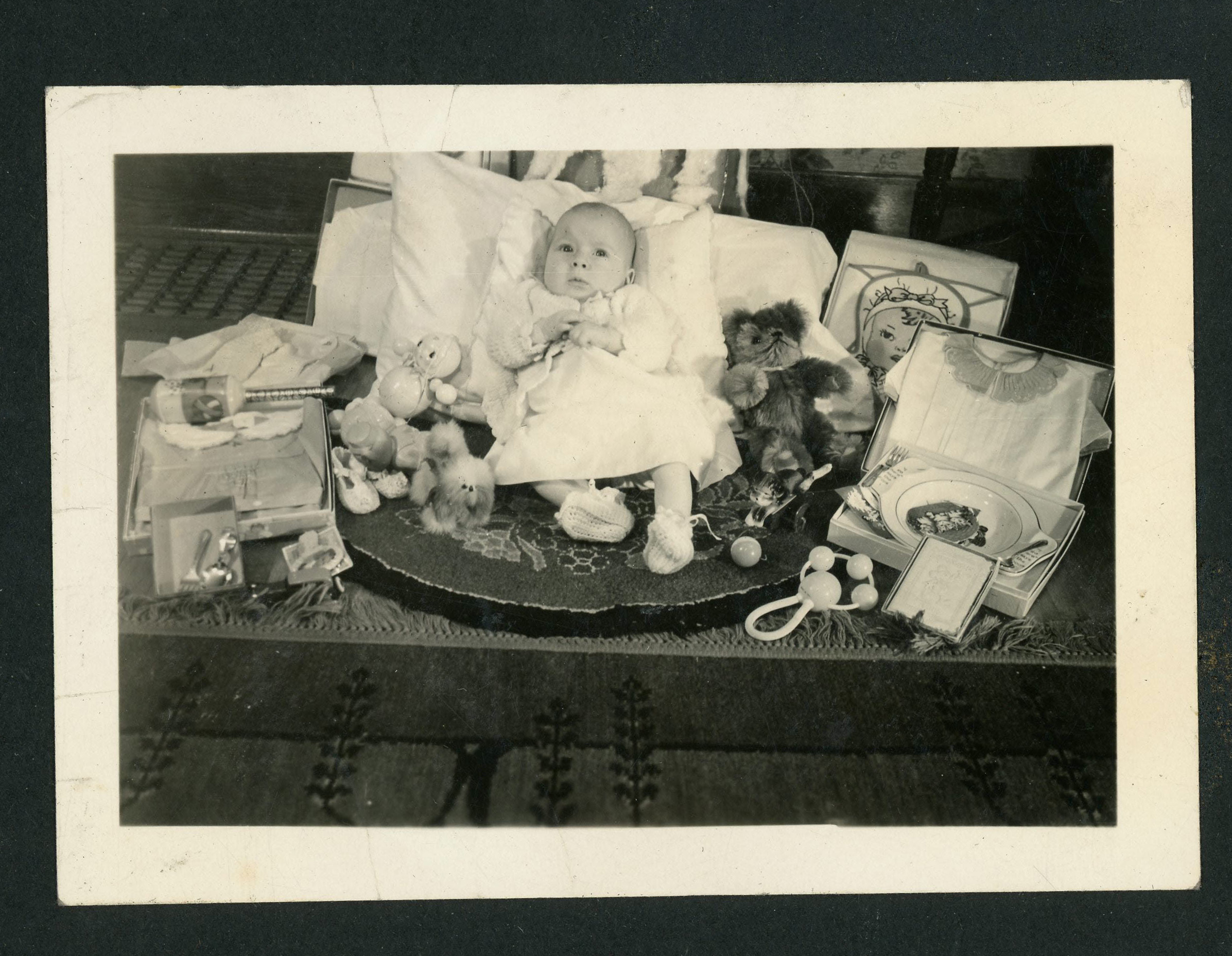 photo beneath - baby and gifts - after Santa came