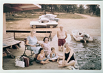 Lake on dock - Connie with Polaroid camera, Cindy, Helen, Carole, Mink. Libby