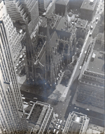 Looks like a church in Manhattan taken from tall building - August 16 1956 stamped on back
