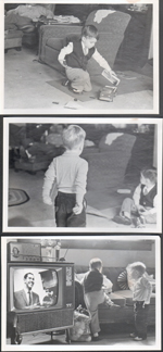 loose pictures - 3845 Capitol - Alan and Ronnie playing in living room. Man on TV.