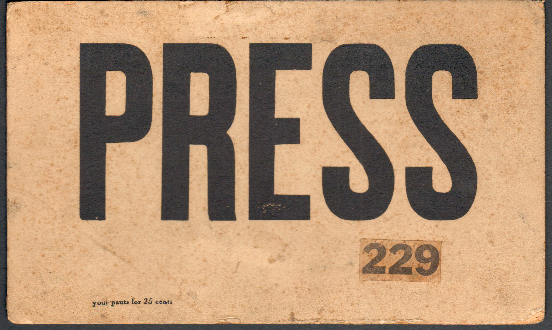 John D Hague's Press Your Pants car sign