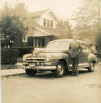 old car on Carrollton in front of 6115