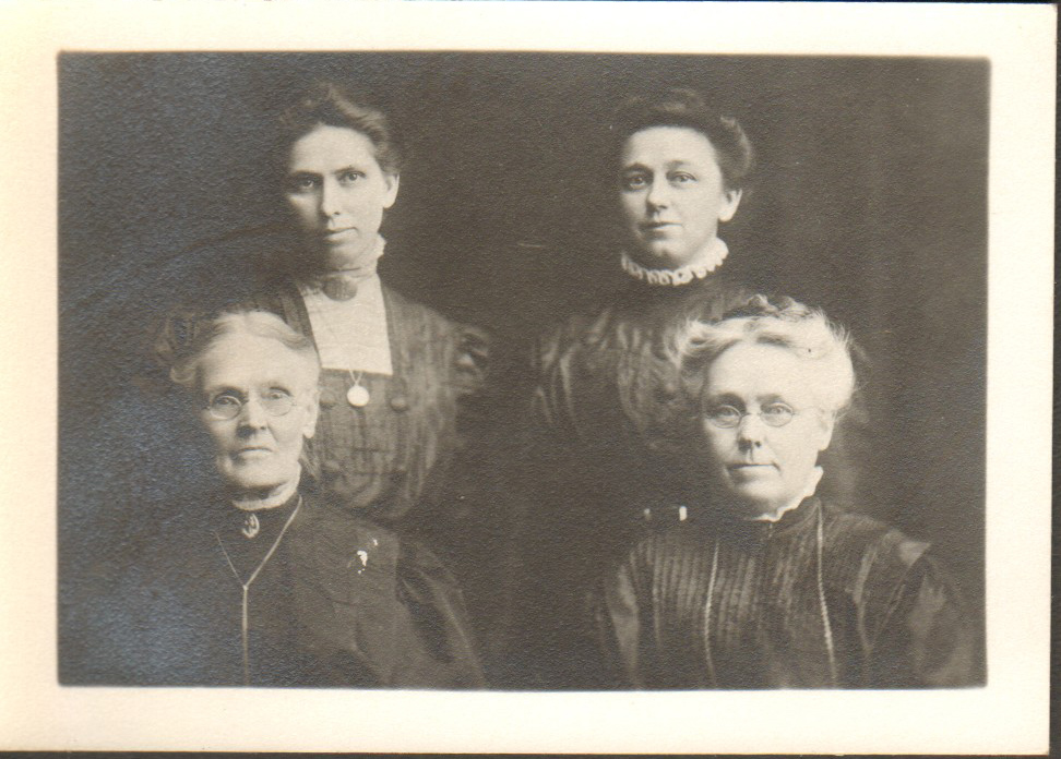 Family women - Seated: Girstle's Grandma Underwood, Aunt Ida Eller. Standing: Aunt Nola Maker, Girstle's mother Clara Hague