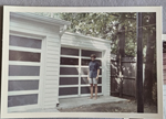 6122 north garage - Susan in front of finished garage