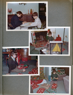 Christmas 6122 - Susan and Alan writing in living room in front of TV cabinet. Alan with gifts by fireplace - sailboat. Susan with gifts in dining room.