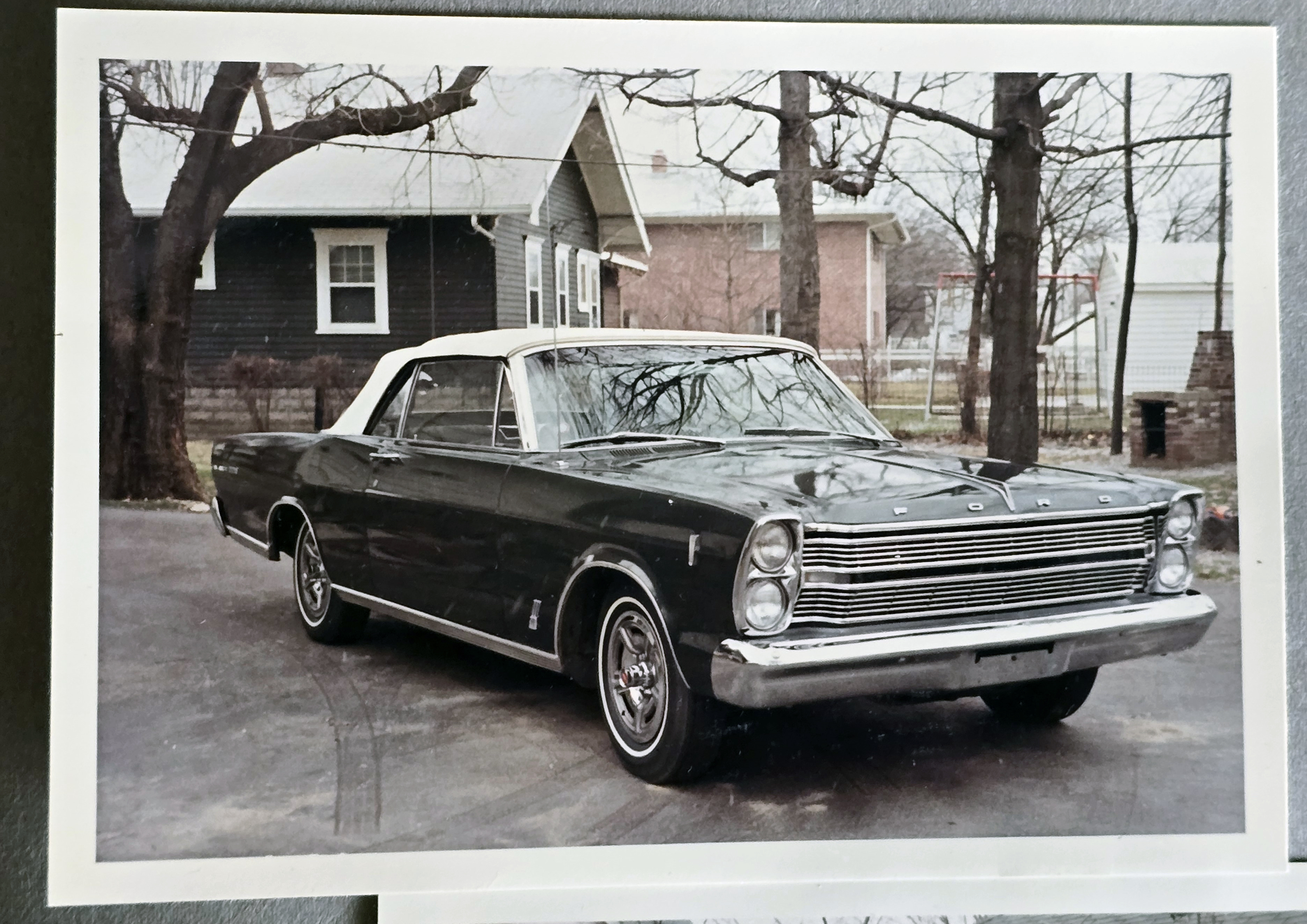 6122 driveway - Ford Galaxie 500 convertible Back of 6114 and apartments.