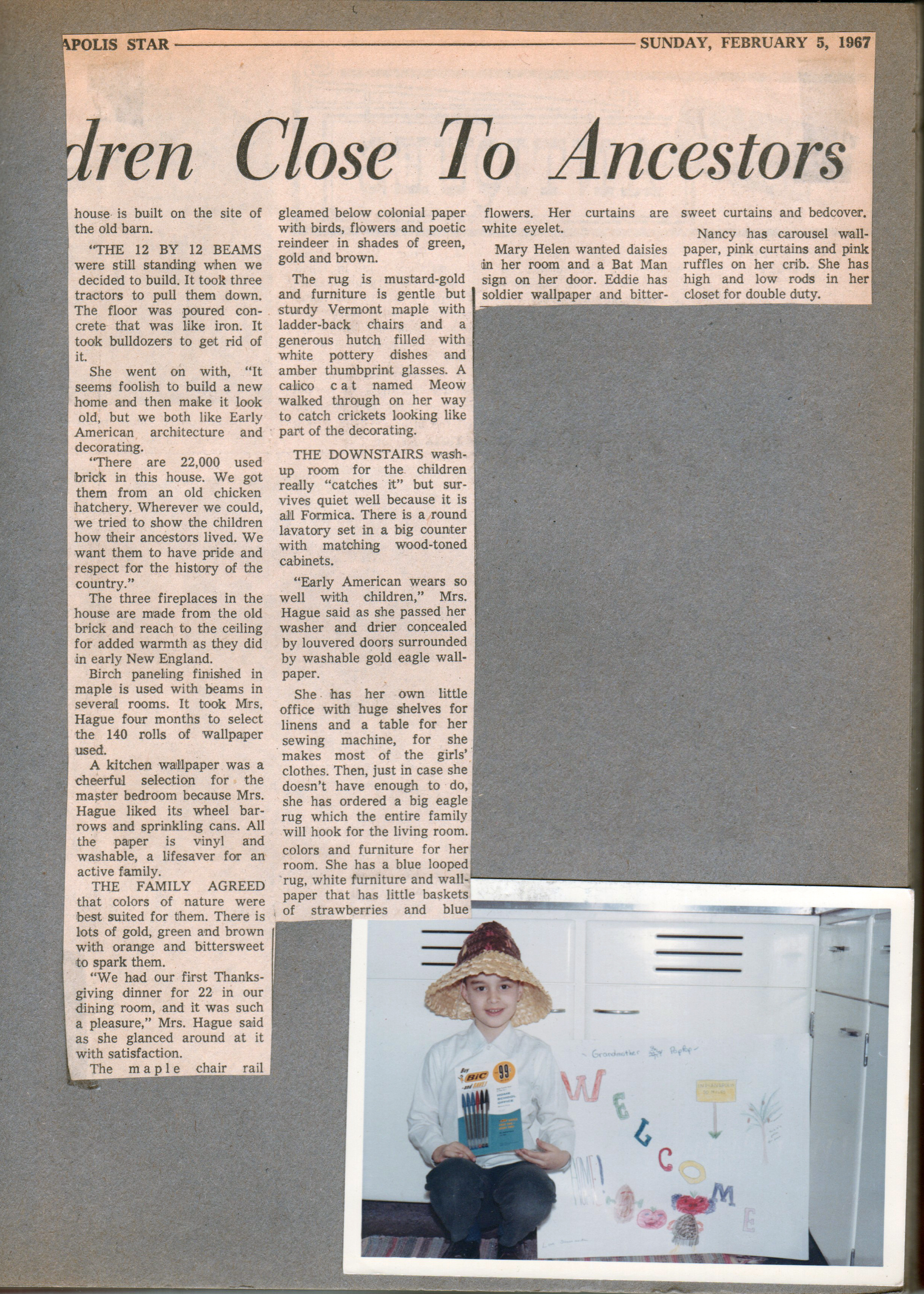newspaper clipping - Farm house keeps children close to ancestors - The Glen Hagues at At 8817 Haverstick. Alan with pens and Welcome sign at 8815 Haverstick kitchen (I think).