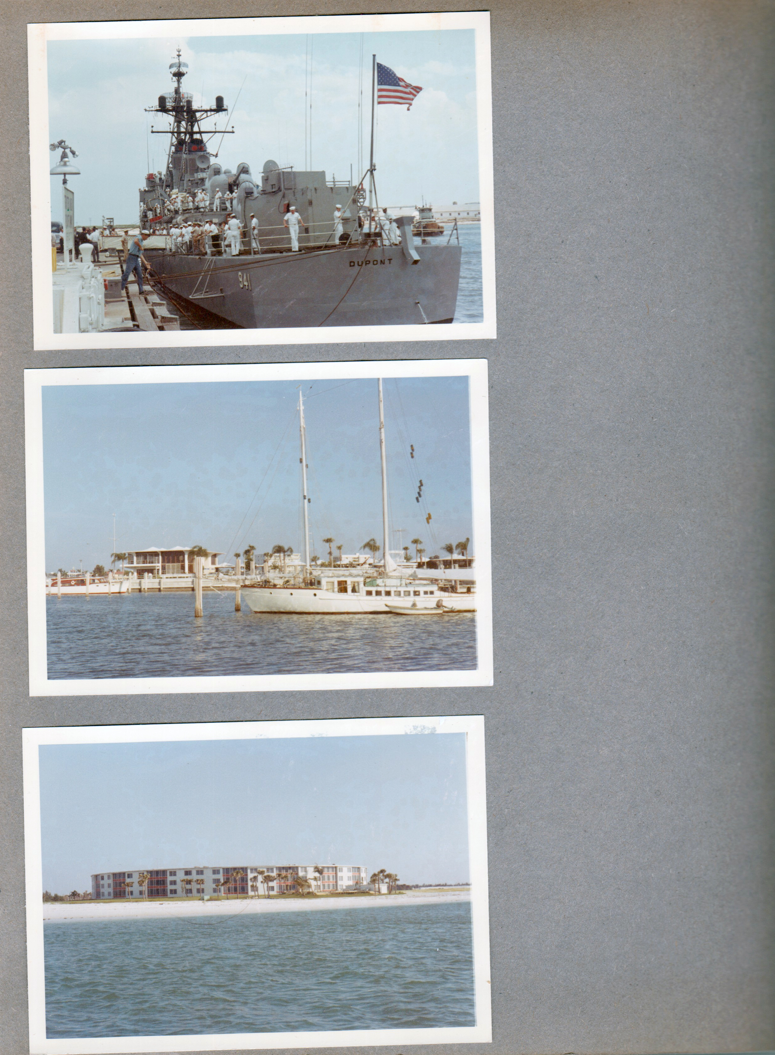 Poseidon missile launch (probably) - Ship docked. Sailboat and building on ocean.