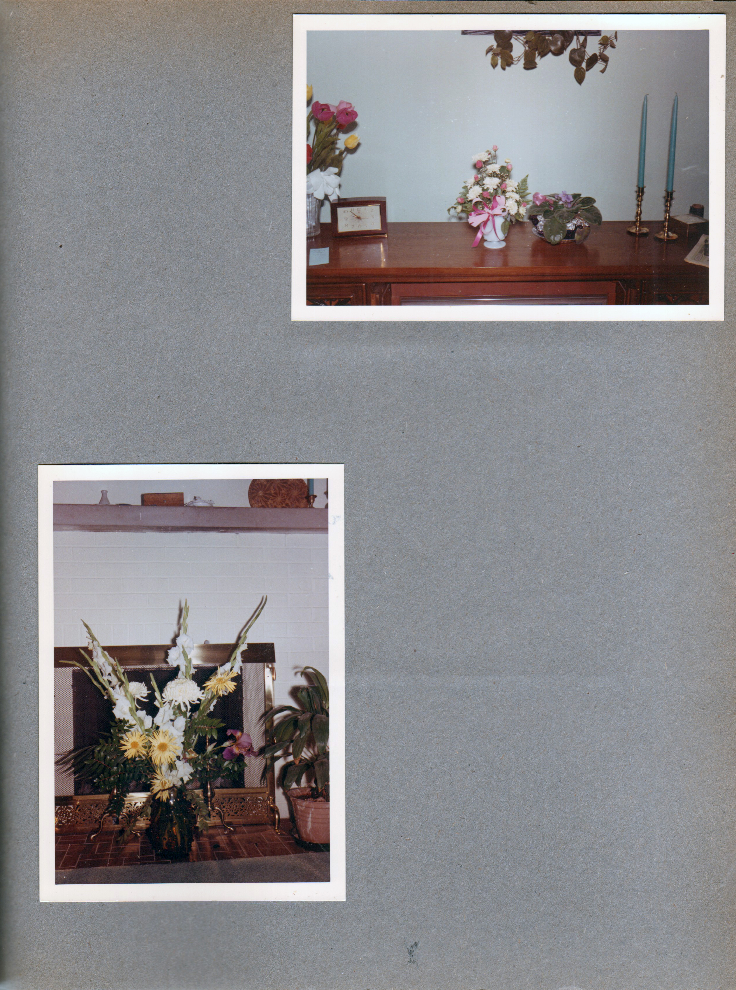 6122 living room - flowers on TV cabinet. Flowers by fireplace