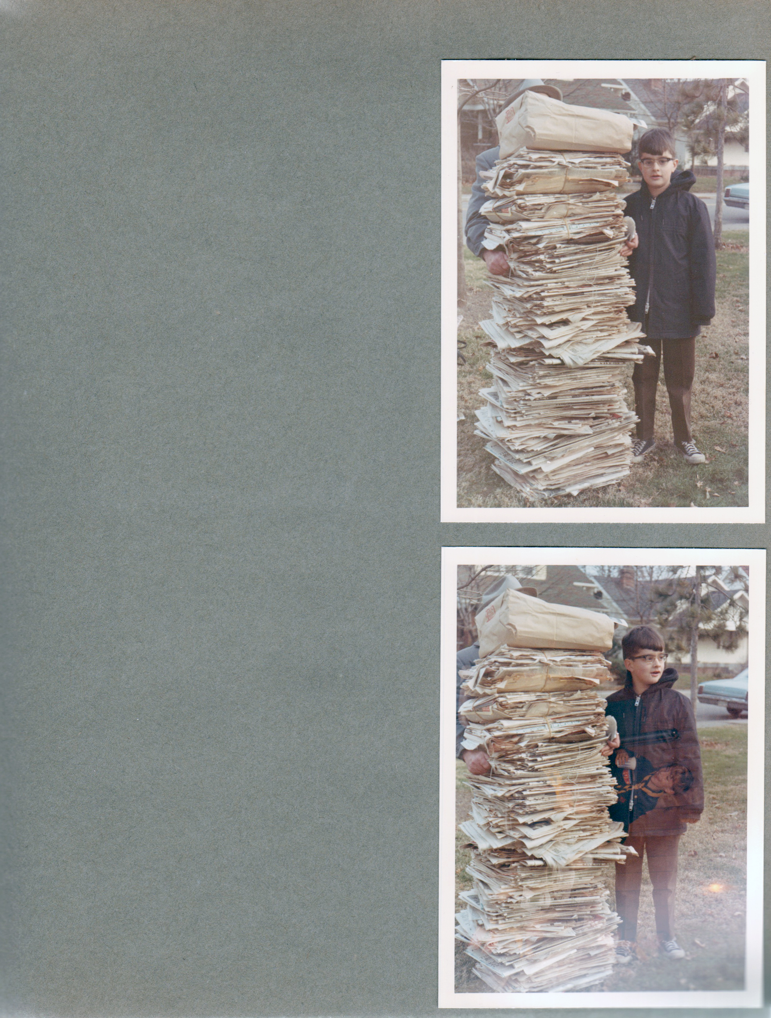 6122 yard - Alan with tall stack of newspapers for paper drive