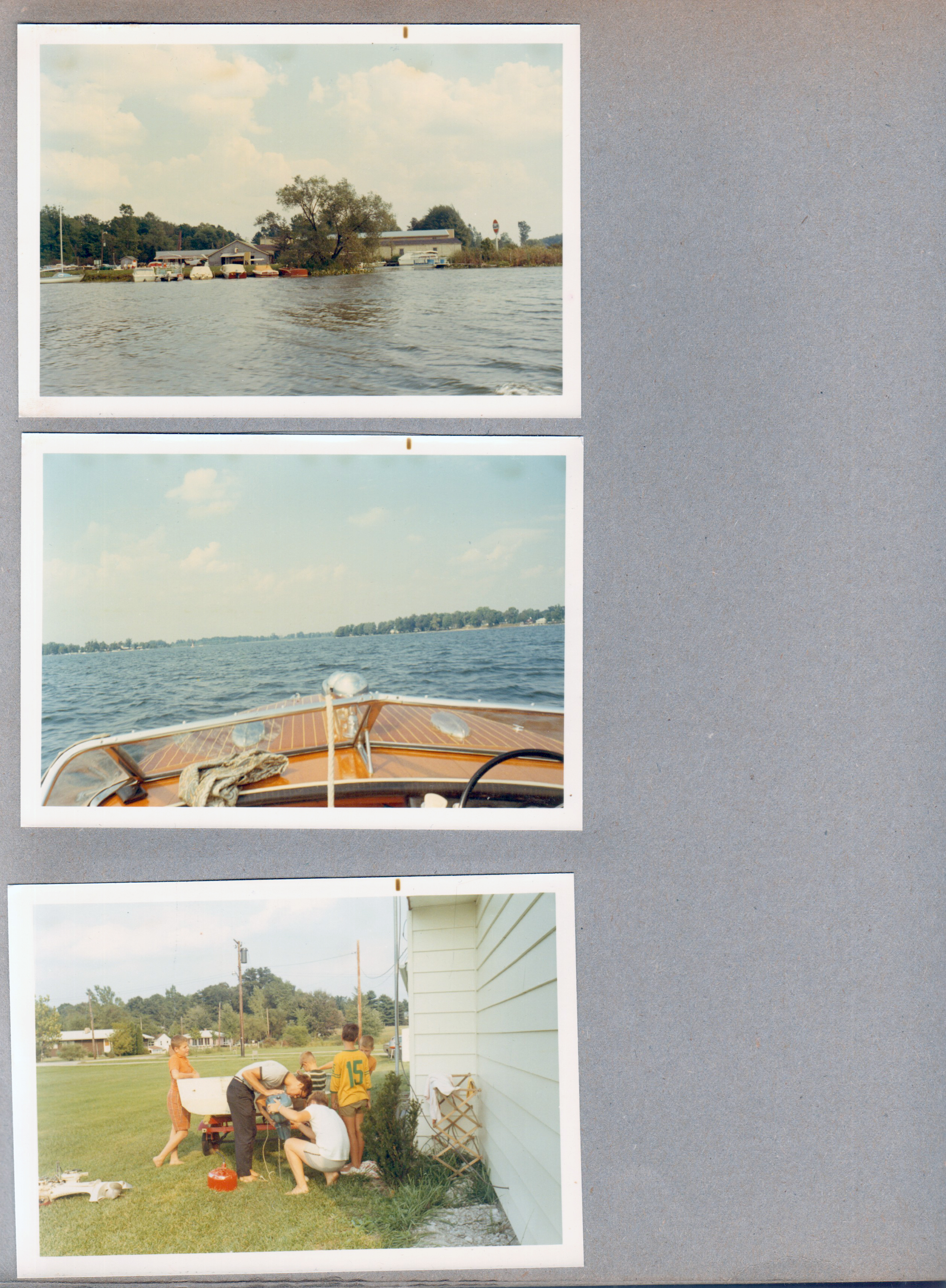 Wawasee - marina. Johnson Bay from boat. working on boat motor at Sprague's - Alan
