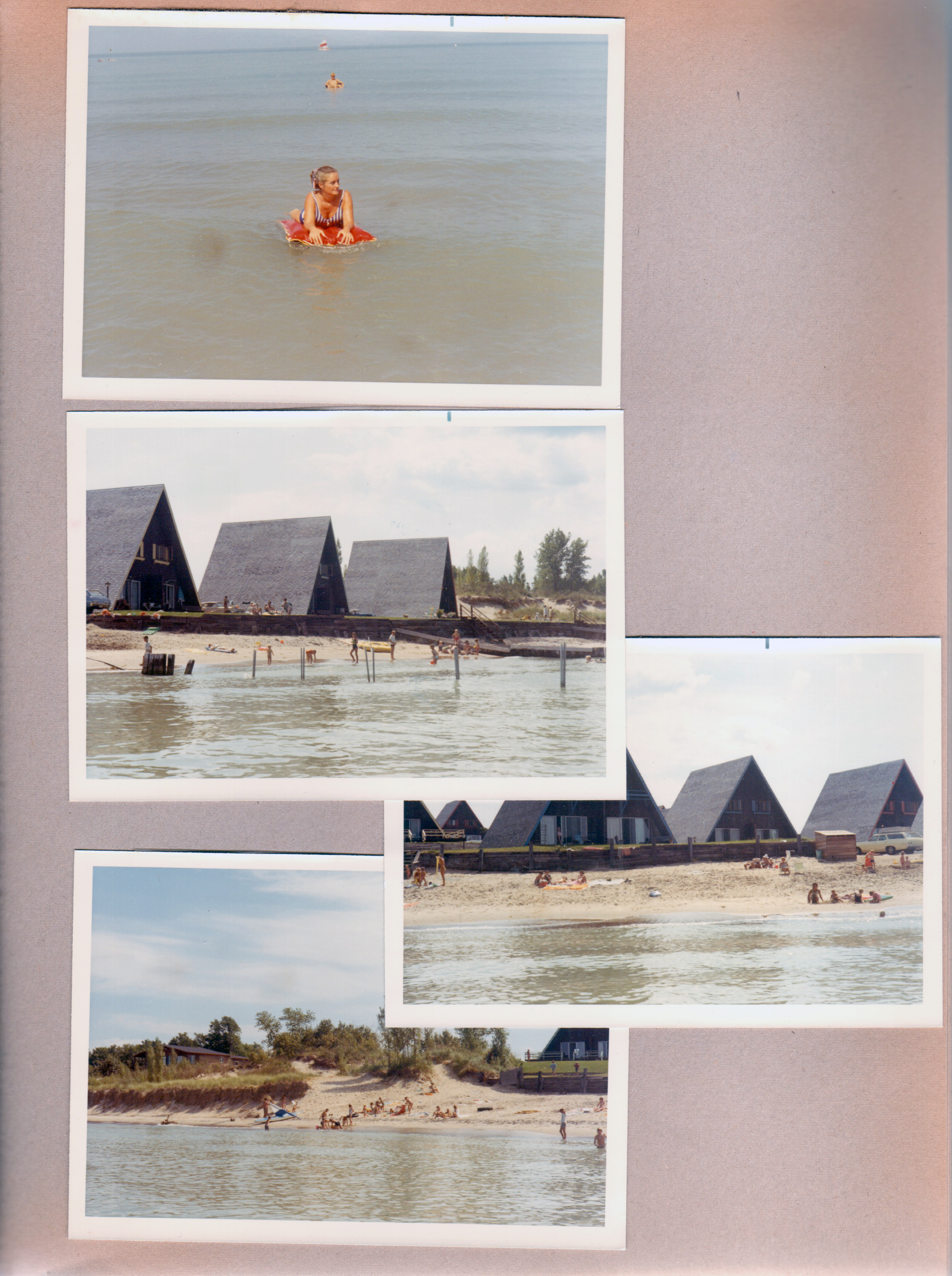 Chalet on the Lake - on the beach - Rosemary on raft. Our blue chalet from Lake Michigan.