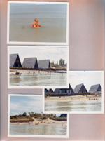 Chalet on the Lake - on the beach - Rosemary on raft. Our blue chalet from Lake Michigan.